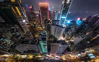 hong kong skyline at night rising from the ground